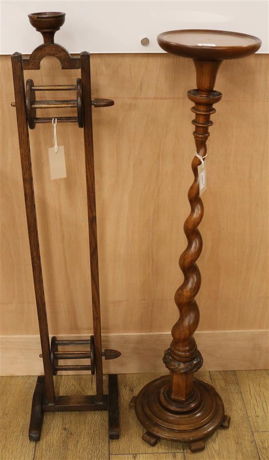 A mahogany torchere-cum candlestick and an oak wool winder (2) H.100cm